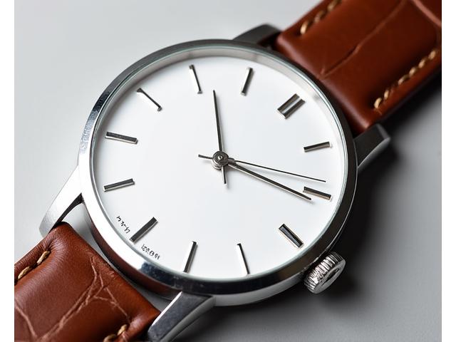 Elegant Dress Watch with a minimalist white dial and leather strap